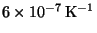 $6 \times 10^{-7}\,\rm K^{-1}$